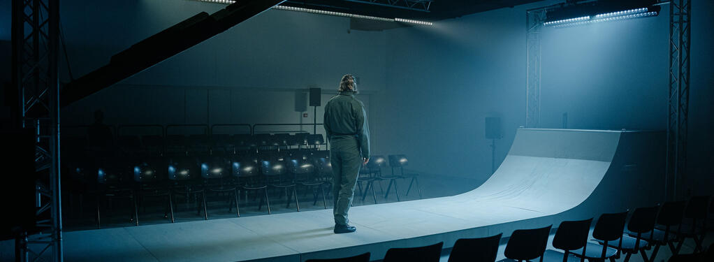 Photograph from Grounded - lighting design by Edward Saunders