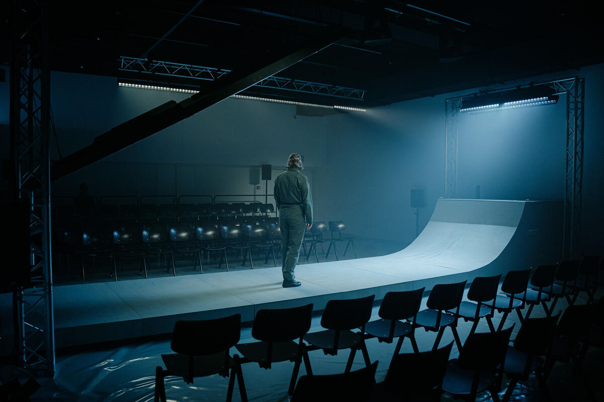 Photograph from Grounded - lighting design by Edward Saunders