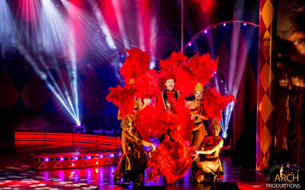 Photograph from Mr Tickertons Clockwork Circus - lighting design by Archer