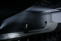 Photograph from Grounded - lighting design by Edward Saunders