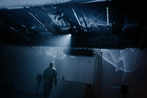 Photograph from Grounded - lighting design by Edward Saunders