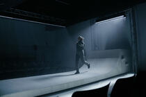 Photograph from Grounded - lighting design by Edward Saunders