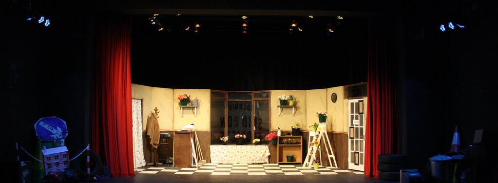 Photograph from Little Shop of Horrors - lighting design by robynlaweslx