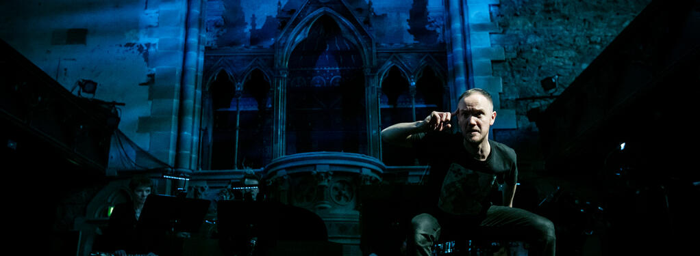 Photograph from 8 Songs for a Mad King - lighting design by Simon Hayes