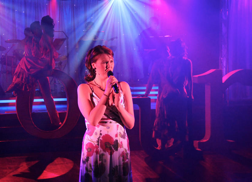 Photograph from Amour - lighting design by David Totaro