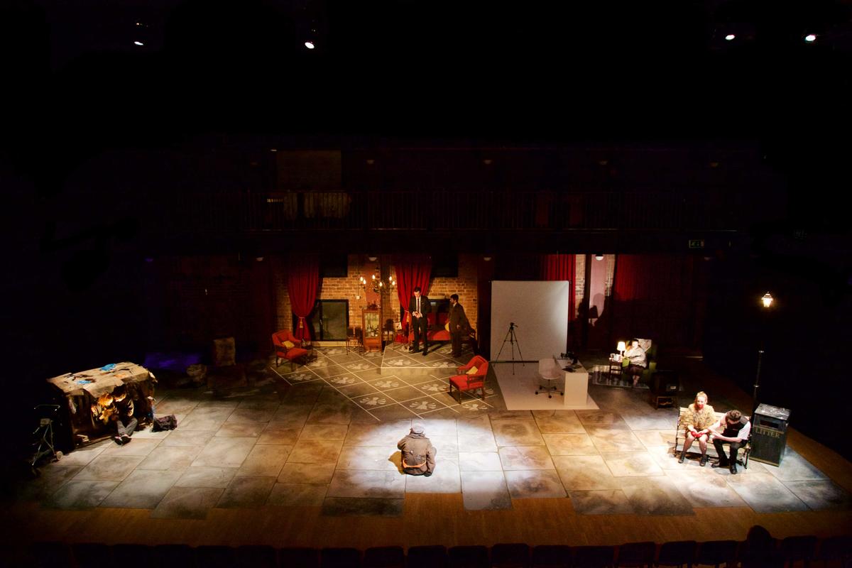 Photograph from The Strangeness of Others - lighting design by George Leigh