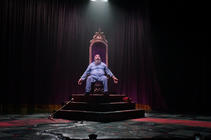 Photograph from Exit The King - lighting design by HawkinsLX